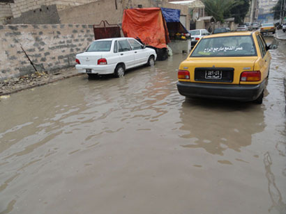 تقرير مصور عن مناطق في كربلاء بعد يوم ممطر