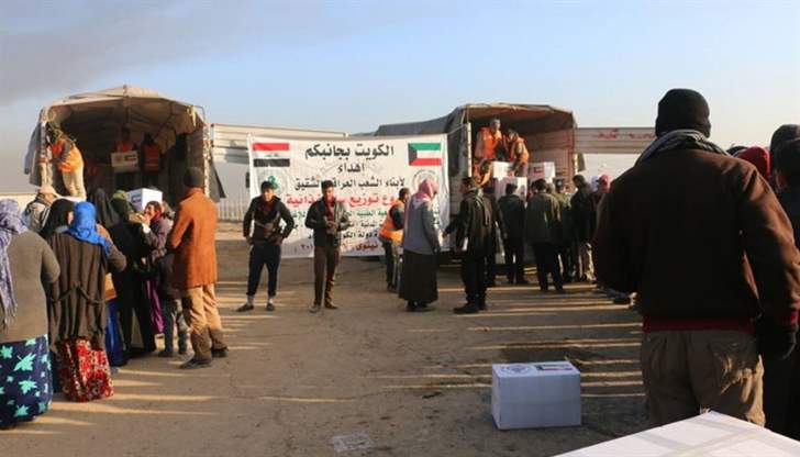 150 طناً مساعدات غذائية كويتية للأحياء المحررة في الموصل