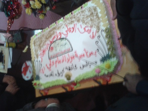 مجلس كربلاء يحتفل بمولد الامام علي واحد اعضاء المجلس يصف امريكا بالشيطان الاكبر لانها تريد ان تعيش المنطقة بفوضى دائمة