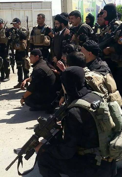 بالصورة :الخطيب الحسيني محمد الصافي مع الفرقة الذهبية وابطال الجيش العراقي