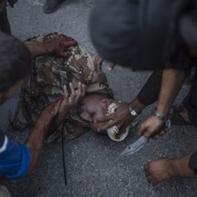 بالصور.. مراسل التايمز: القاعدة تذبح اسراها بوحشية القرون الوسطى