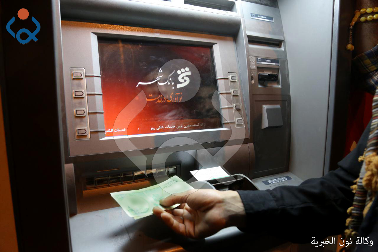 بالصور: نصب صرافات آلية لمصرف ايراني حكومي في كربلاء