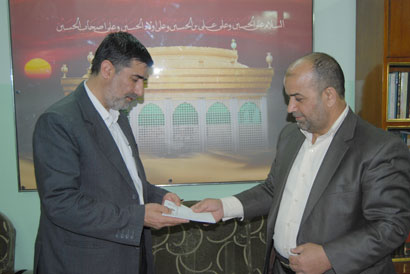 وزير الشباب والرياضة يكرم القائمين على الامانة العامة للعتبة الحسينية