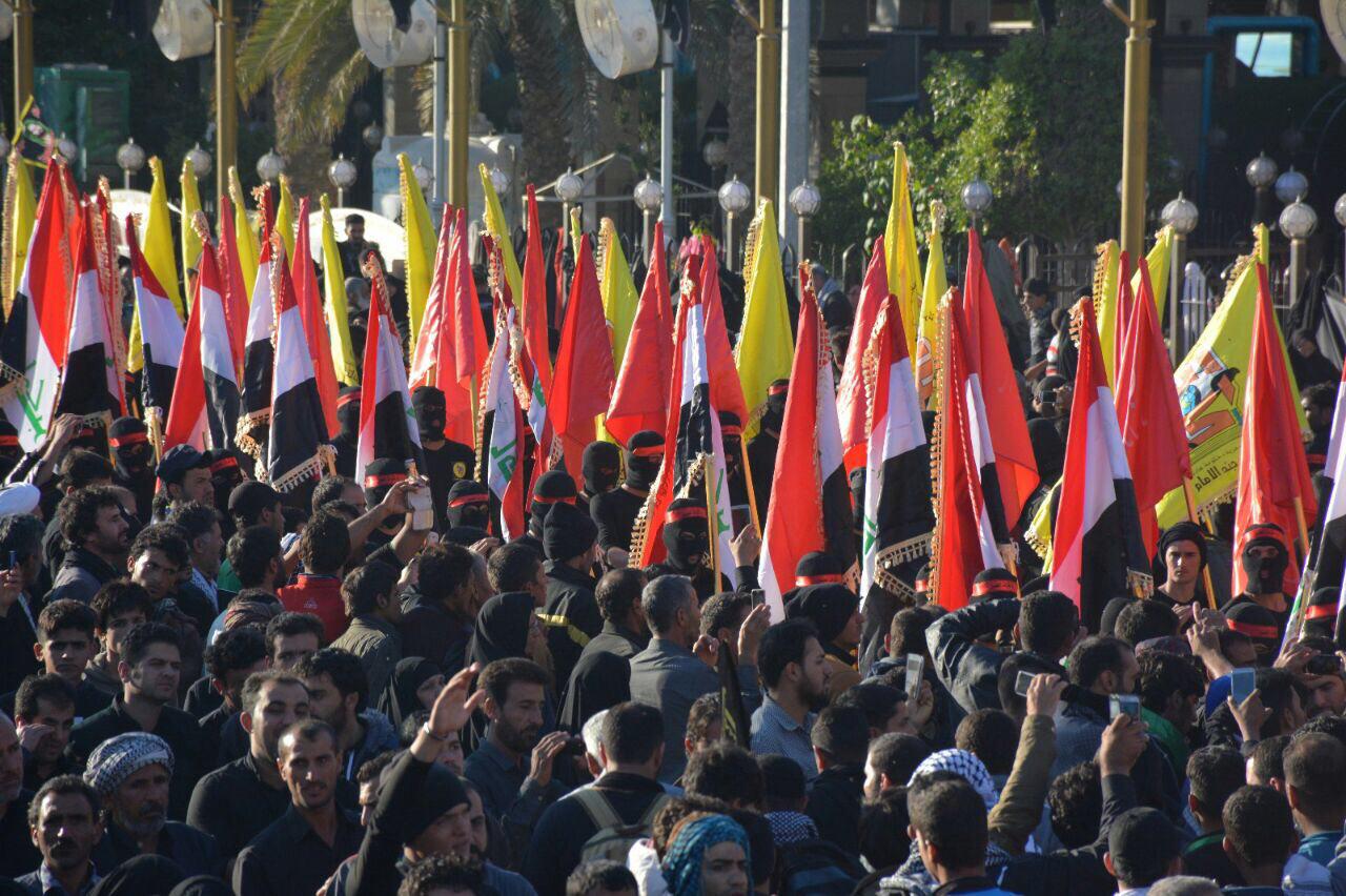 بالصور: الحشد الشعبي ينظم استعراضاً وسط كربلاء ويشارك بثلاثة عشر الف عنصر لحماية زيارة الاربعين