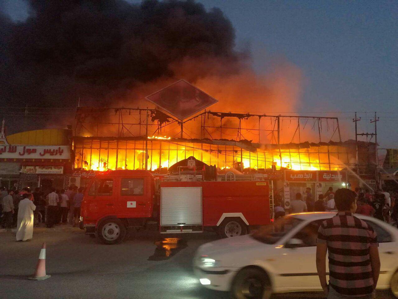 بالصور: اندلاع حريق في "مجمع الذهب" بالنجف