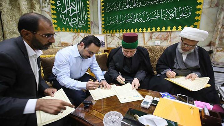 تعرف على مضمون مذكرة التعاون التي وقتها العتبة الحسينية مع هيأة الحشد الشعبي