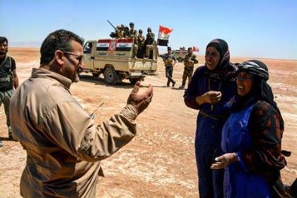 لواء الطفوف ينقذ عشرات النازحين على الحدود العراقية السورية