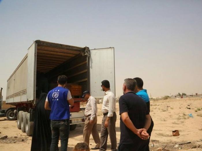 عودة ١٣٢ عائلة نازحة في النجف الى محل سكناها في محافظة نينوى والانبار