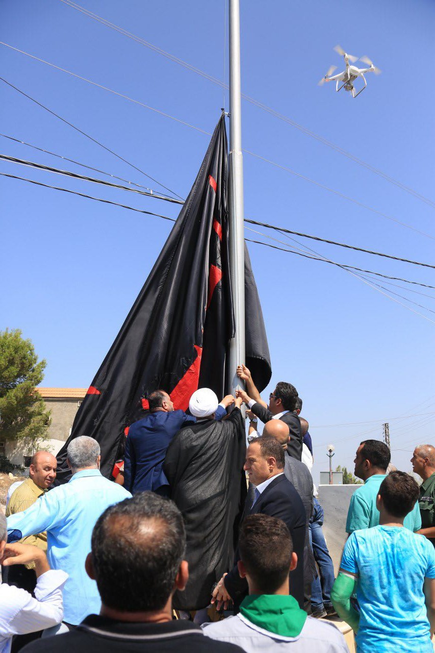 بالفيديو.. رفع راية الامام الحسين (ع) على حدود فلسطين المحتلة
