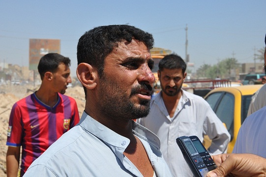 احد الناجين من تفجير كربلاء يصف ما جرى في سوق التحدي وعمليات كربلاء تزيل السوق المستهدف(مصور)