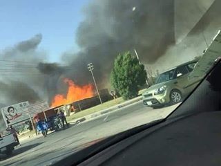 بالصور :حريق في سوق الرقي بمنطقة حي 14رمضان بكربلاء