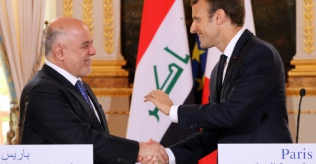 العبادي من باريس يعلن تحرير مدينة الحويجة من ايدي الدواعش