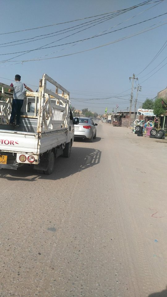 كربلاء:شارع عمره 30 سنه متجاوز عليه ويخدم 8 احياء يعاني زخما مروريا ومعاناة لابناء المناطق