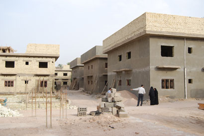 كربلاء :نسب متقدمة في مراحل انجاز مشروع مجمع الامام الرضا (عليه السلام) السكني الخاص بالايتام (مصور)