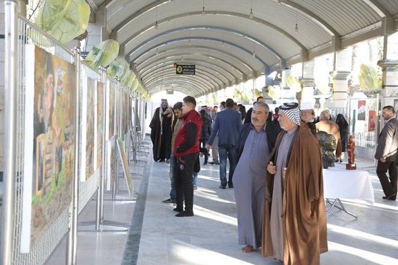 بالصور:افتتاح مرسم يوثق بطولات الحشد الشعبي بين الحرمين الشريفين وسط كربلاء