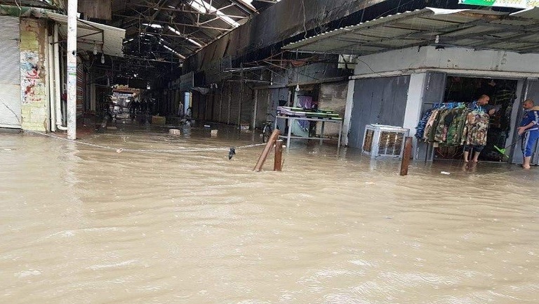 بالصور:الامطار تغرق مدينة الفلوجة