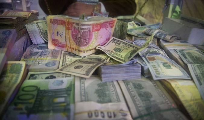 ارتفاع طفيف بسعر صرف الدولار امام الدينار