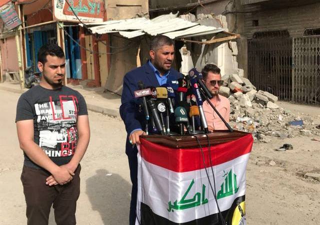 فصيل قتالي تابع للعتبة العباسية يدعو من "ركام الموصل" إلى تكثيف الجهود لبنائها