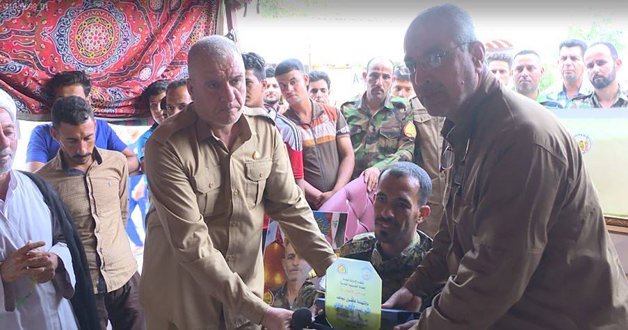 جريح حشد شعبي تعرض الى شلل رباعي يحصل على شهادة الماجستير