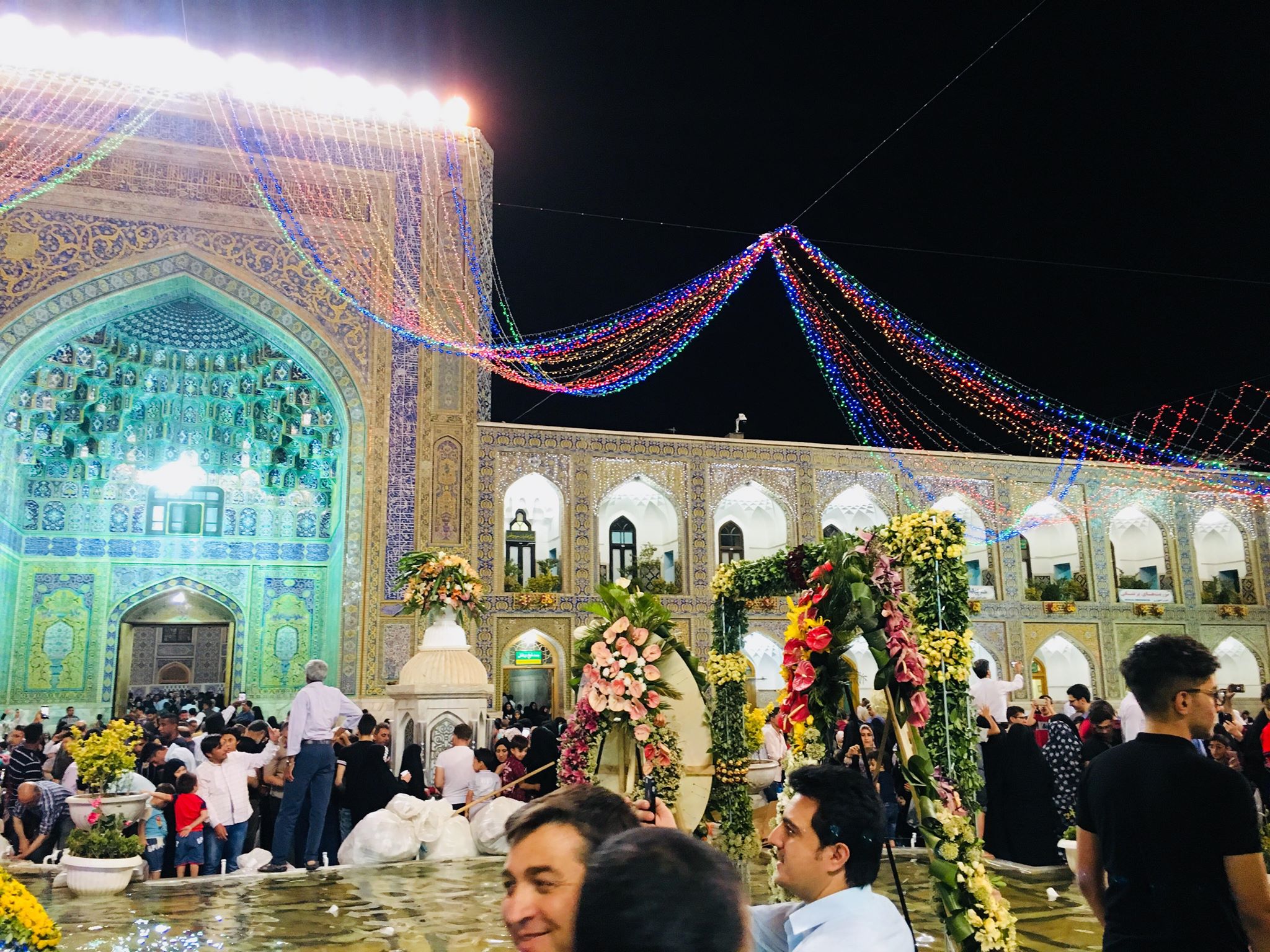 بالصور اجواء احتفالية بذكرى مولد الامام الرضا (ع) في مشهد الايرانية