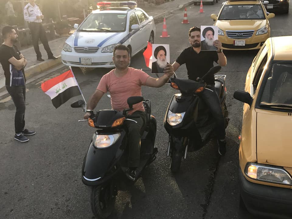 بالصور :مسيرات في بغداد تؤيد تحذيرات السيد السيستاني للقوى السياسية