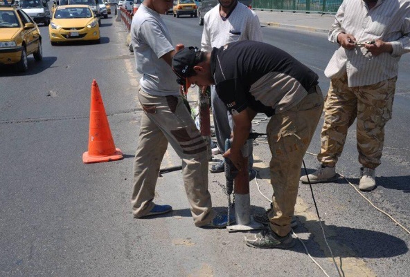 صيانة جسر الدورة الكبير في بغداد
