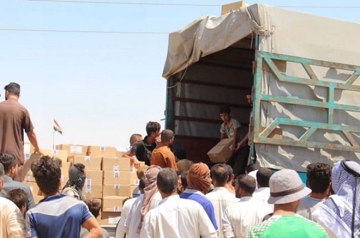 بالصور:السيد السيستاني يغيث اهالي قرى حوض حمرين بمساعدات انسانية