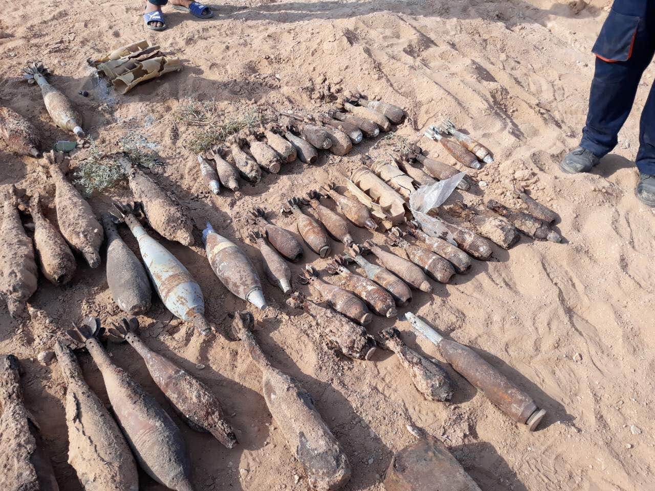 بالصور: رفع اكثر من 100 مقذوف حربي في كربلاء