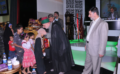 العتبة الحسينية توزع هدايا العيد على 250 يتيم