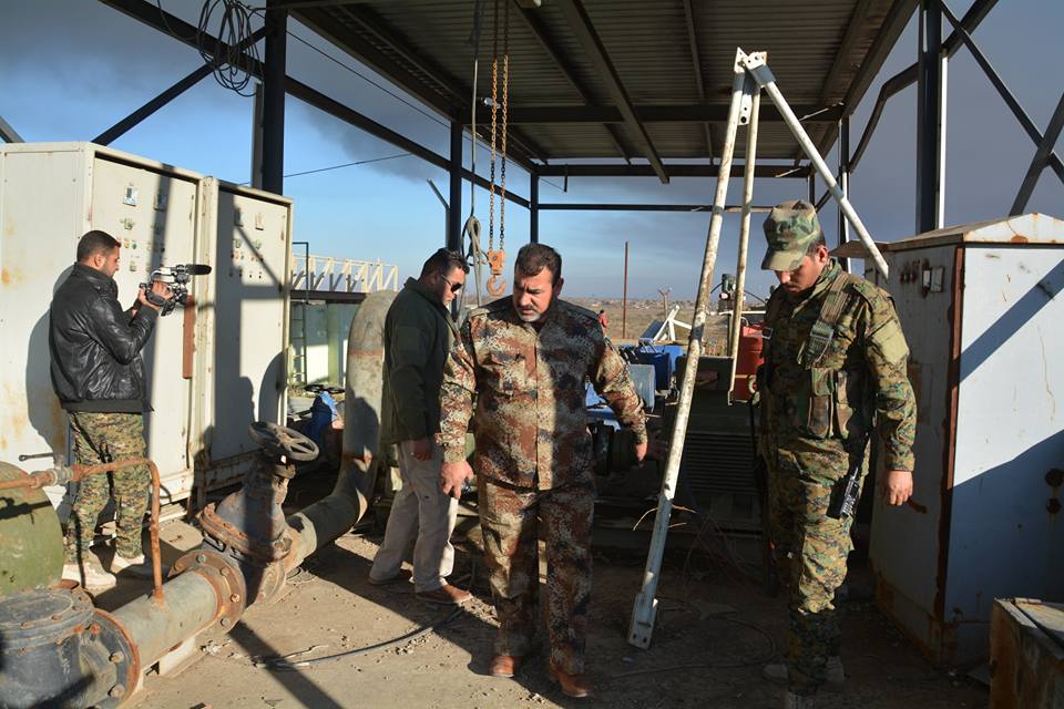 بالصور:فصيل تابع للعتبة الحسينية يؤهل محطة مياة القيارة ويوفر لها الجهد الامني