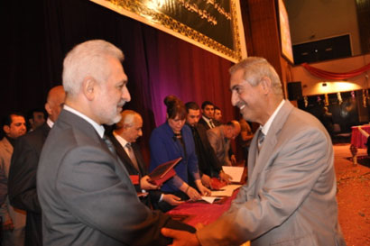 جامعة الكوفة تتبؤ المركز الأول في الجودة والأداء الجامعي بين الجامعات العراقية في احتفالية يوم العلم