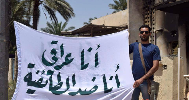 بالصور: عراقيون شيعة يتبرعون مجاناً لإصلاح أضرار الاعظمية