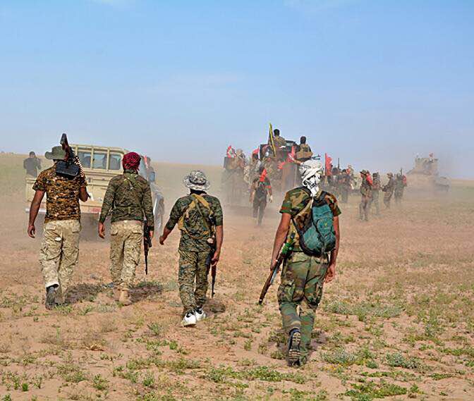 بالصور: لواء الطفوف يحرر قرية "ثري الكراح" ويبيد "لواء الفتح" التابع لداعش غرب الموصل