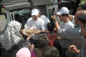 توزيع مواد غذائية الى (56000) شخص مهجر في كربلاء ولمدة عام