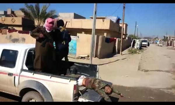 داعش تستعرض بأشلاء 3 شهداء طيارين عراقيين في كركوك