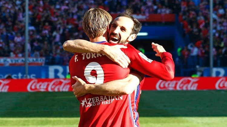 أتلتيكو يهزم غرناطة ويشارك برشلونة في الصدارة