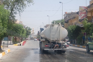 بلدية كربلاء المقدسة حملات عمل موسعة لتنظيف منطقة حي العامل وغسل الشوارع