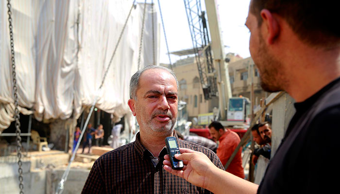 بالصور :نفق في باب قبلة الامام الحسين مجهز بسلالم كهربائية