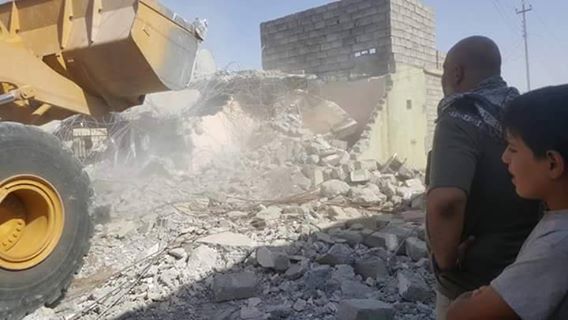 بالصور:هدم دور الدواعش في الشرقاط من قبل الاهالي