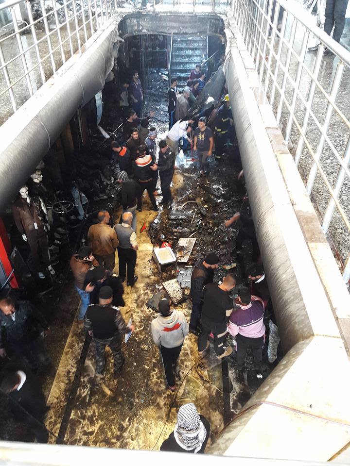 بالصور :حريق كبير يلتهم سوقا للملابس وسط الكوت