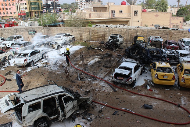 بالصور :تفاصيل تفجير سيارة مفخخة في كربلاء