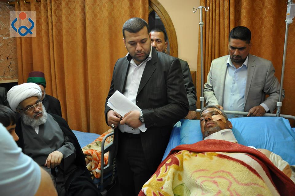 بالصور:ممثل المرجع السيستاني يتفقد جرحى العمليات العسكرية في قاطع بيجي
