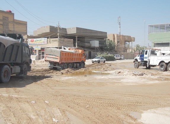 اغراق تقاطع حيوي في كربلاء بالماء والوحل (مصور)