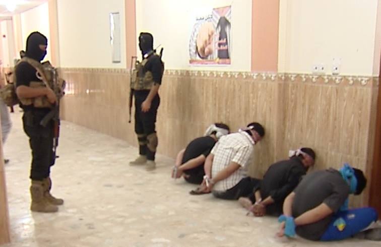 القبض على خلية ارهابية في النجف بحوزتها كميات كبيرة من الاسلحة والذخائر