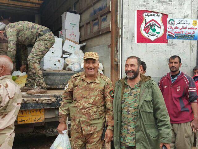 لواء الطفوف يُسير موكب لإغاثة النازحين تلبية لنداء المرجعية من خلال موكب الرسول الاعظم