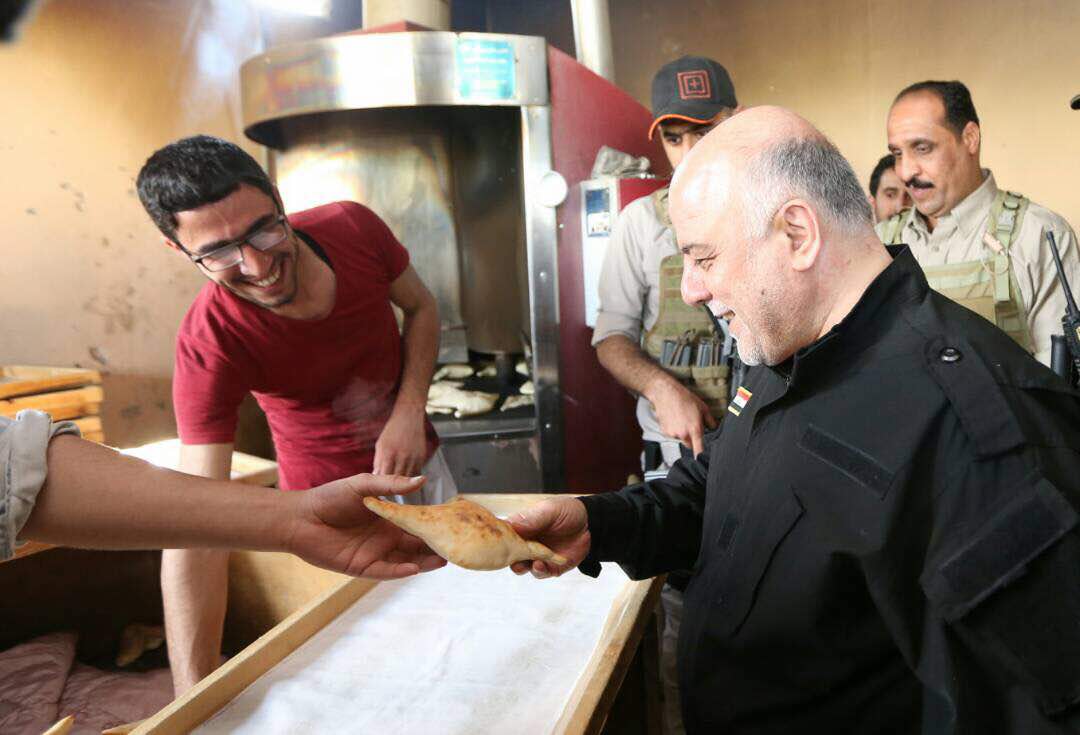 تقرير مصور: العبادي يتجول في احياء الموصل