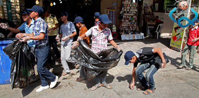 كربلاء :حملة (العراق اجمل) التابعة لكشافة الامام الحسين عليه السلام تقوم بتنظيف مركز المدينة القديمة (مصور)