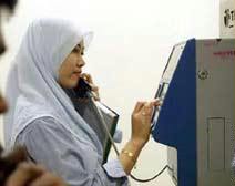 ولاية ماليزية تحظر التبرج والكعب العالي