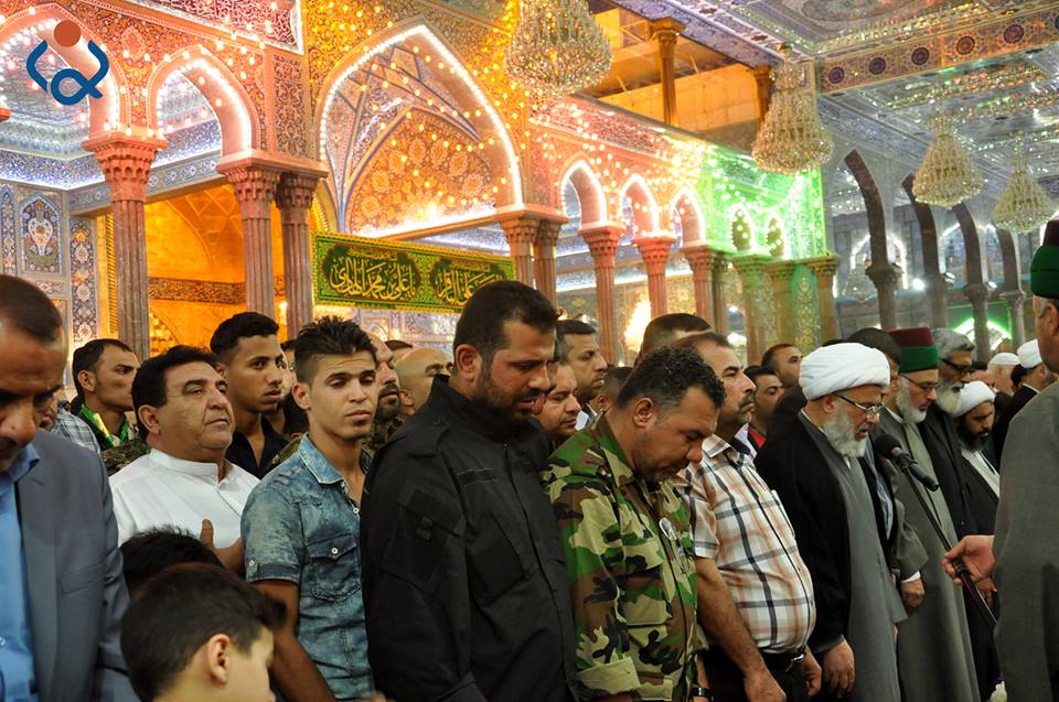 بالصور:ممثل المرجع السيستاني يشارك بتشييع احد شهداء لواء علي الاكبر