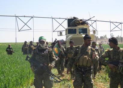 لواء علي الاكبر يصد هجوما واسعا على قطعاته في بيجي ويكبد الاعداء خسائر كبيرة ويقتل انتحاريين صينيين(مصور)